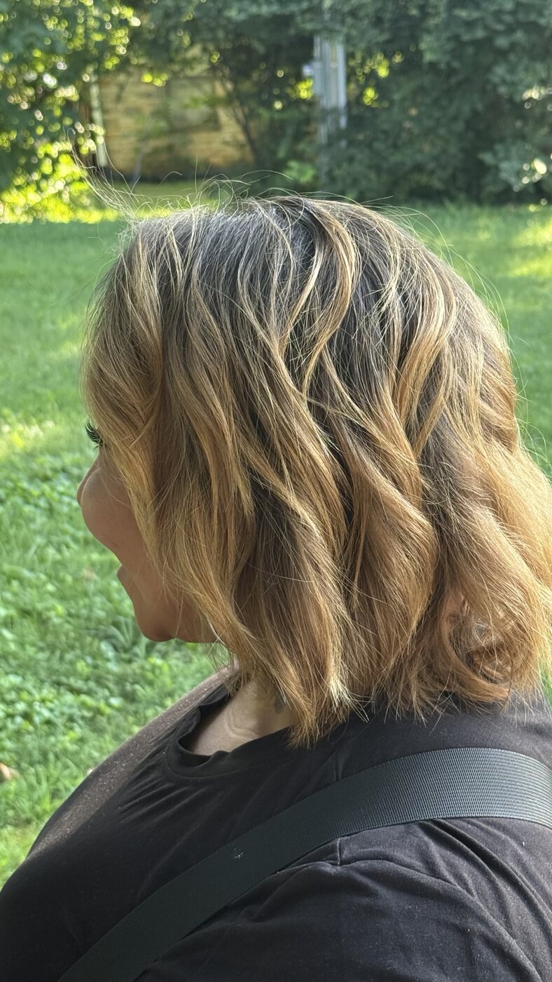 Dimensional bronde long bob viewed from the side