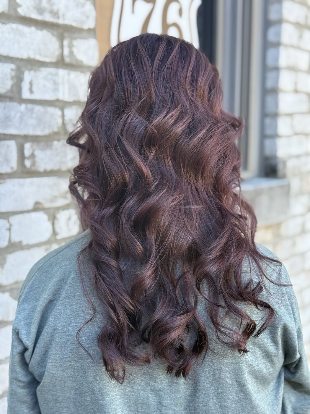 Deep burgundy color finished in glossy waves