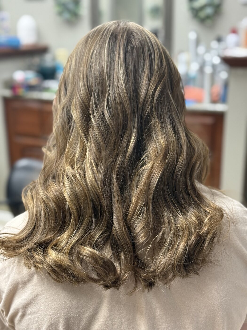 Brunette hair with dimensional caramel highlights