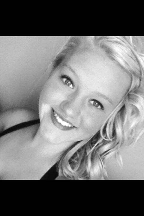 Blonde hair styled in soft curls