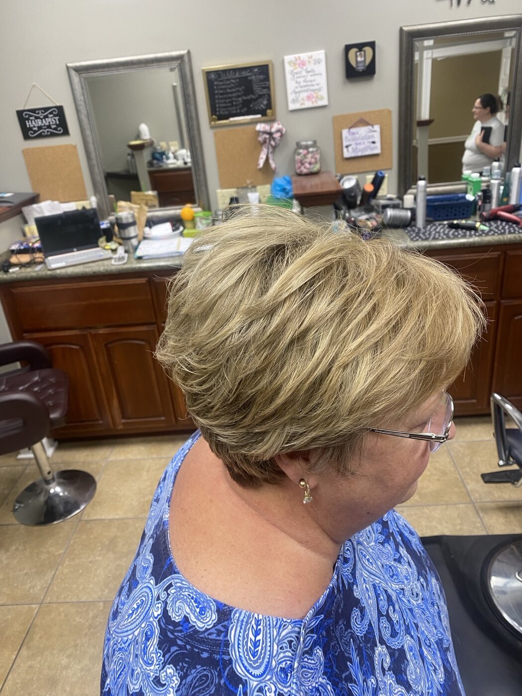 Short honey-blonde cut with softly stacked layers