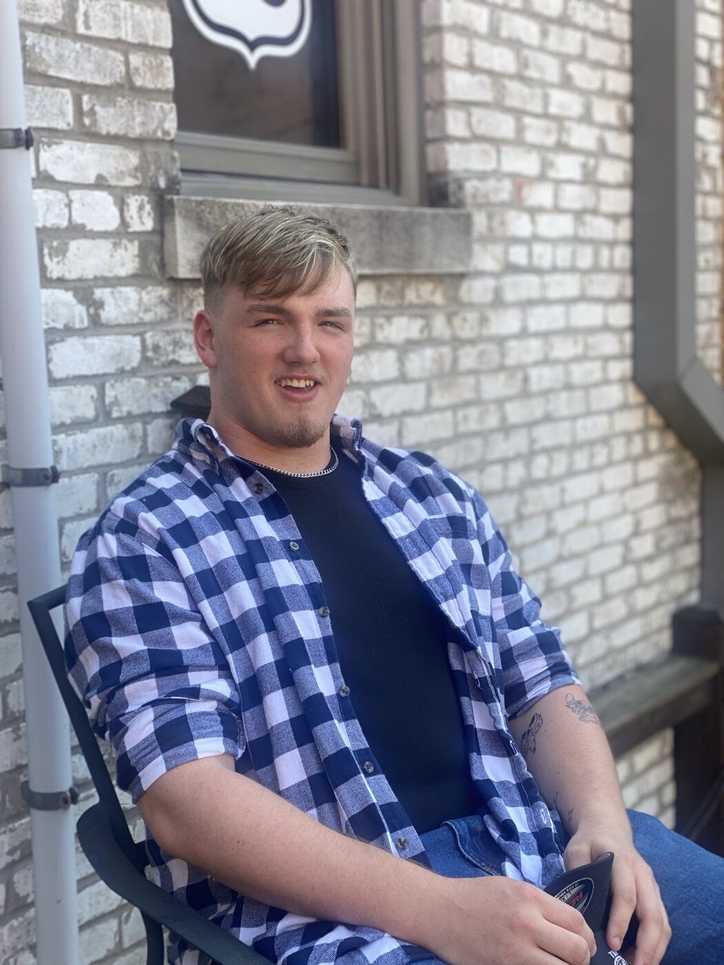 Men's disconnected haircut styled with volume