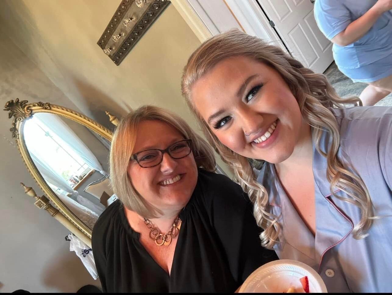 Amy with a client after special-occasion styling