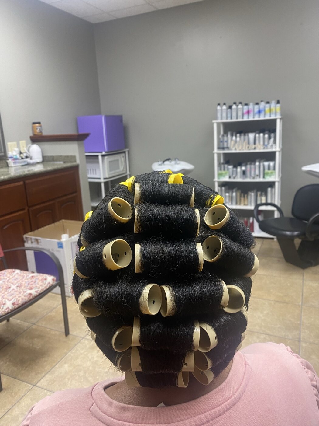 Professional perm rod set in progress