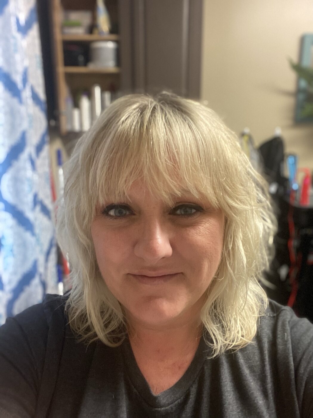 Platinum blonde cut with textured face-framing layers