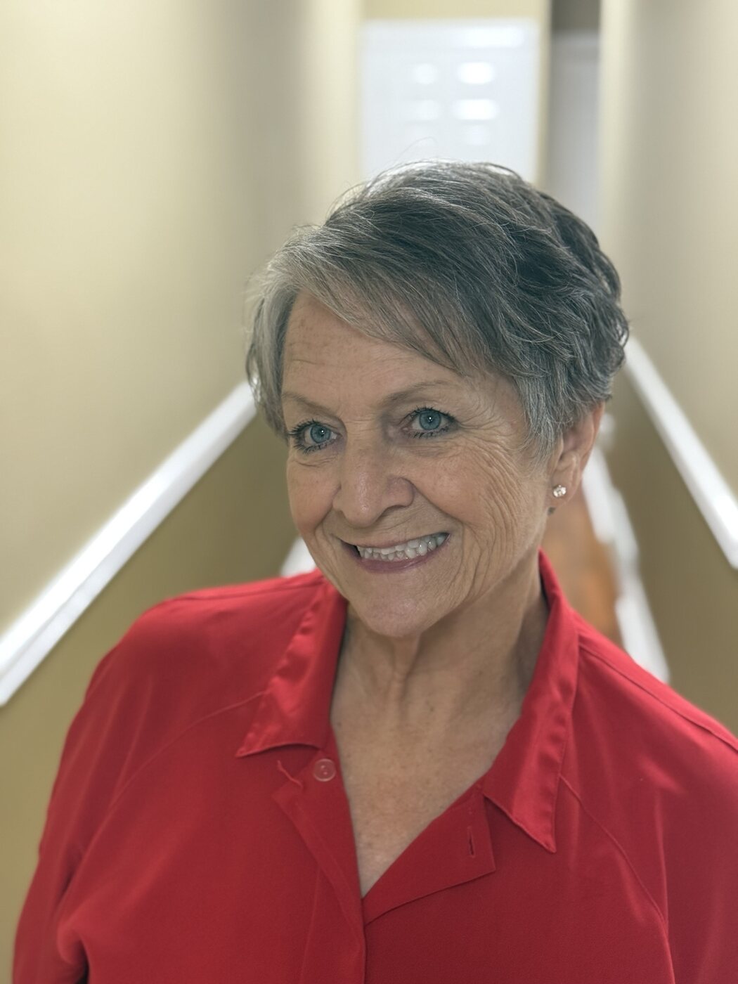 Short silver pixie cut viewed from the front