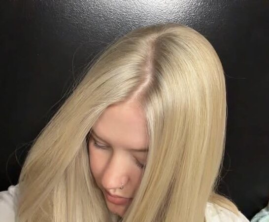 Sleek blonde long bob with a bright even finish
