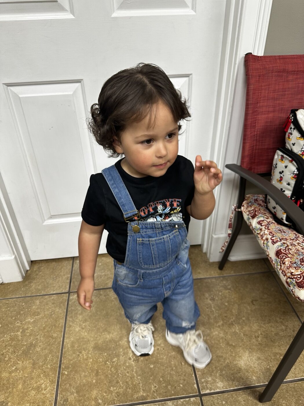 Toddler's hair styled in soft curls