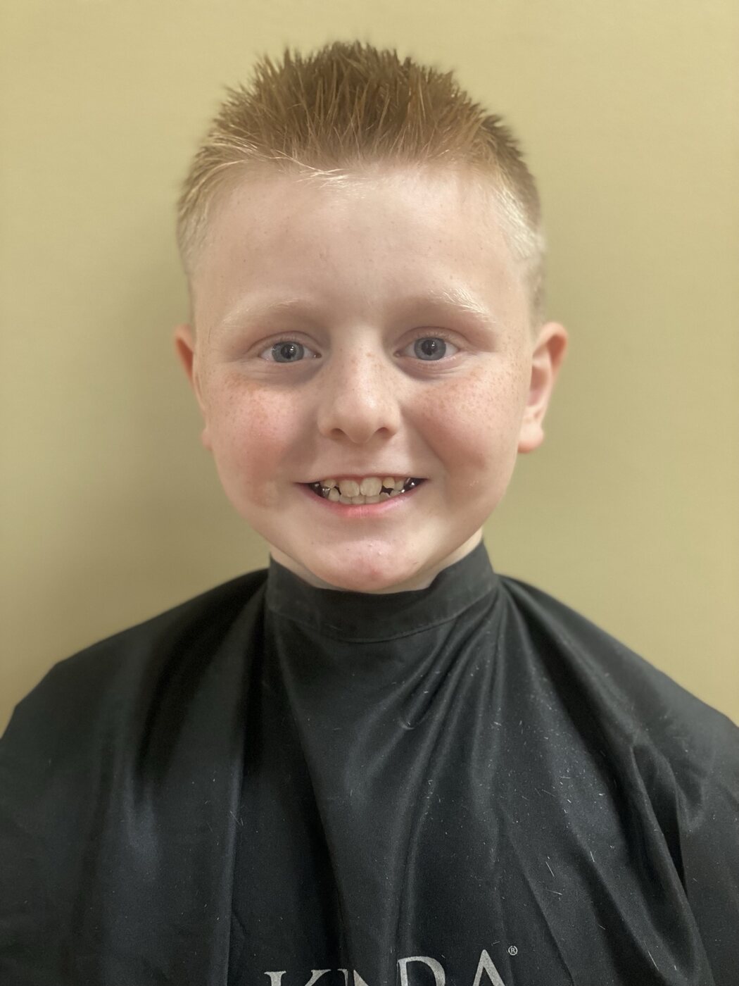 Youth haircut with a clean short finish